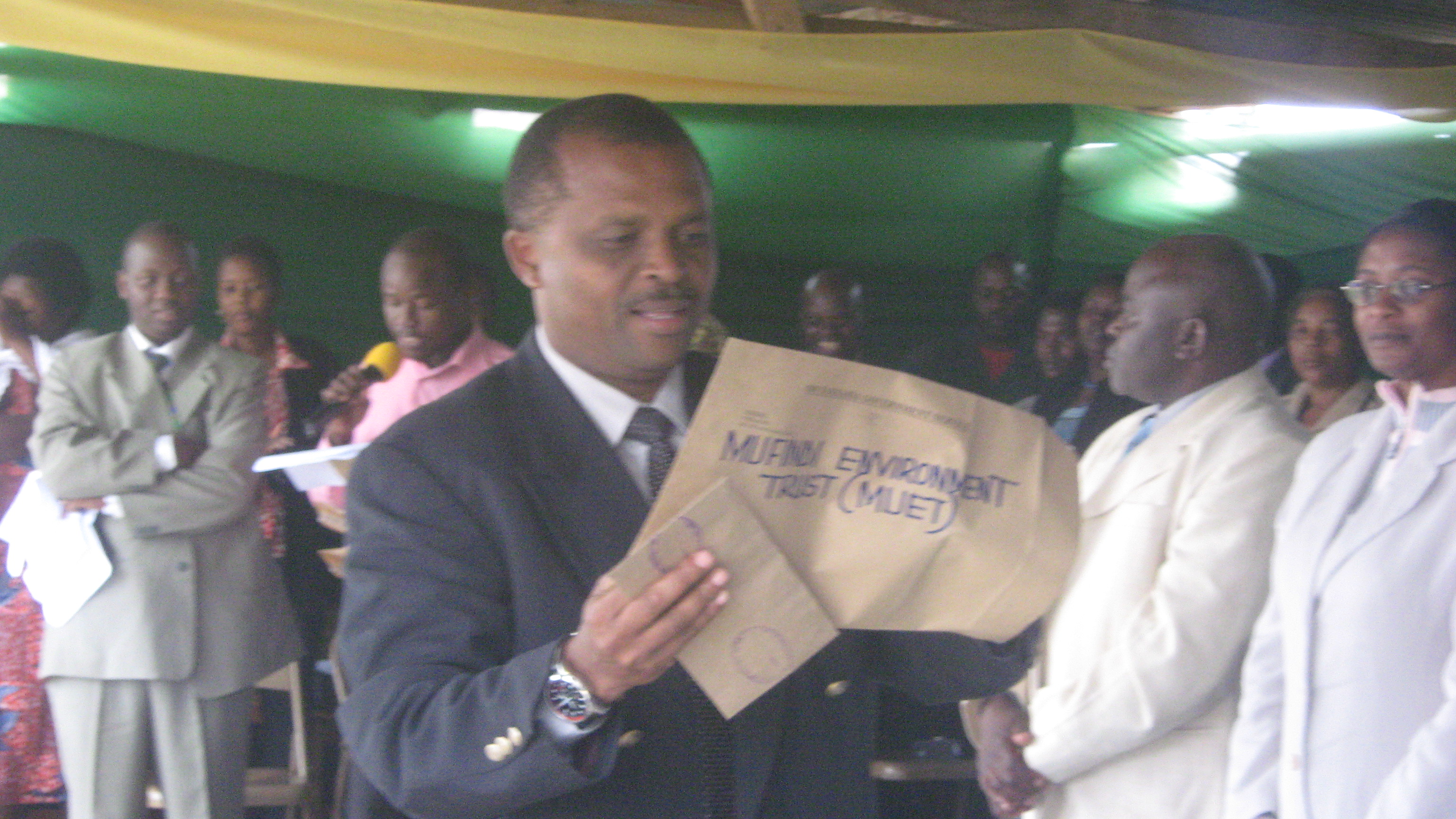 MUET receiving a certificate of appreciation for environmental care from Mufindi District Council