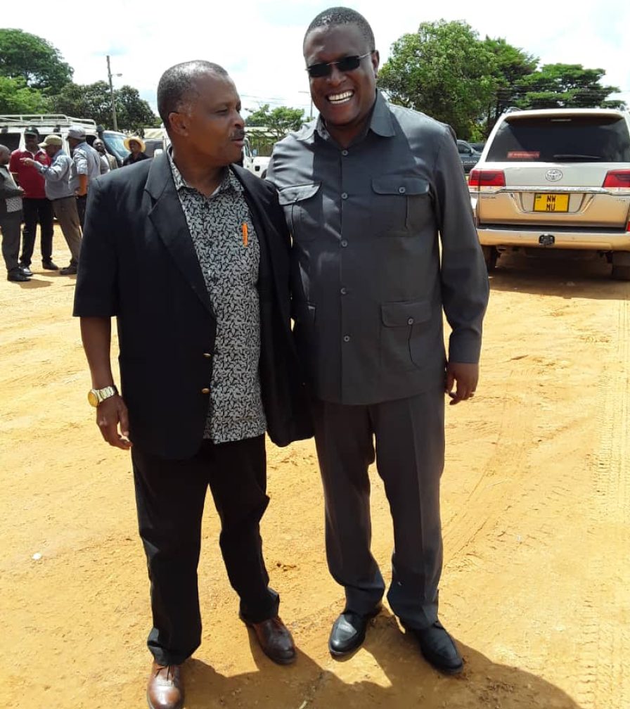The-Chairman-of-MUET-and-Director-of-Tree-Planting-Mufindi-with-the-Minister-of-Information-Hon-Moses-Mnauye-enjoying-the-event-896x1008